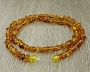 Янтарь светлый, мелкая и овальная галька, бусы длиной 55см