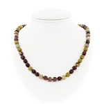 Яшма австралийская (мукаит),  граненые кубики 7мм, бусы "Текта", длина 50+4см